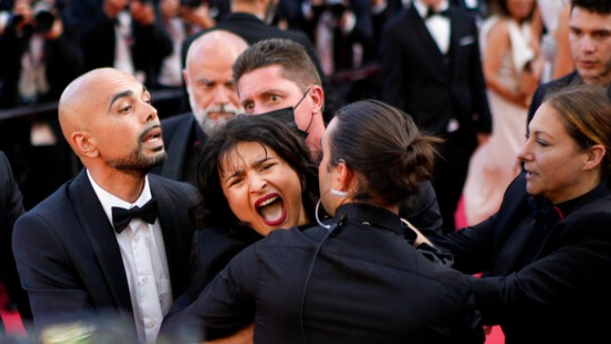 Topless Woman Removed From Cannes Red Carpet After Pro Ukraine Protest